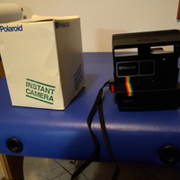 Macchine fotografiche Polaroid e BenQ digitale