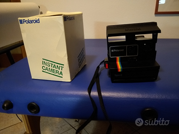 Macchine fotografiche Polaroid e BenQ digitale