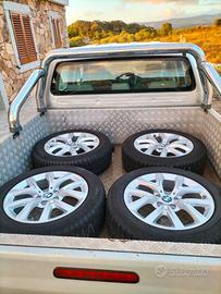Quattro cerchi per BMW X1 completi di gomme invern