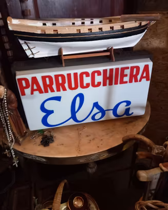 insegna luminosa
