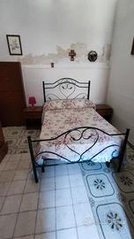 Letto una piazza e mezza in ferro battuto 