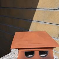 Cappello comignolo in cotto.