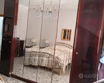 Armadio,comodino e struttura letto