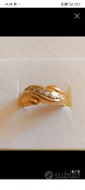 Anello oro 18kt giallo con diamanti