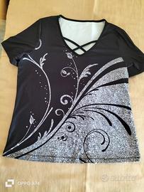 Maglietta nera con disegno argento..