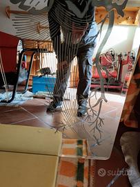 specchiera con motivi ai lati