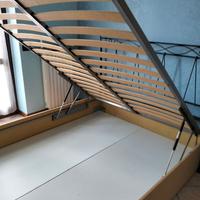 Letto con contenitore - testata in ferro battuto