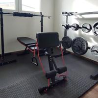 Home gym completa con rack, panca e 110 kg di pesi