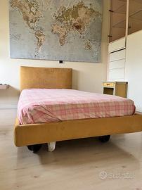 Letto singolo imbottito moderno, con ruote