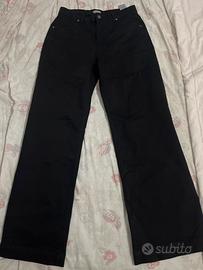 Jeans a gamba ampia neri