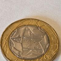 Numismatica moneta 1000 lire con errore di conio.