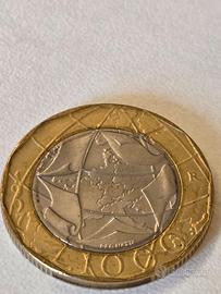 Numismatica moneta 1000 lire con errore di conio.