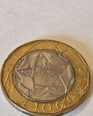 Numismatica moneta 1000 lire con errore di conio.