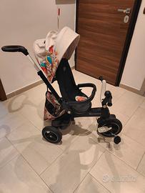 Triciclo con bastone bambina
