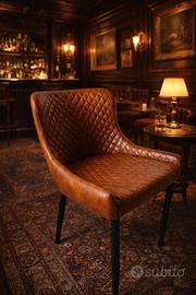 Poltroncina in simil pelle vintage trapuntata