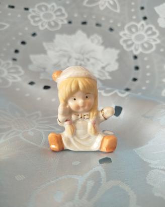 Statuina vintage Bimba con treccine