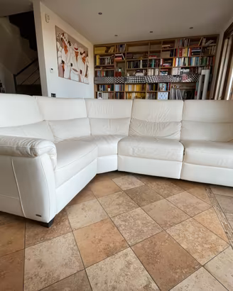 Divano in pelle NATUZZI ad angolo 280x200x100