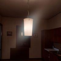 Lampadario a forma cilindrica