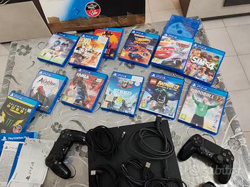 Ps4 (1 TB) con scatola accessori e 13 giochi