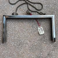 Vecchia cerniera per borse