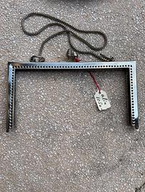 Vecchia cerniera per borse