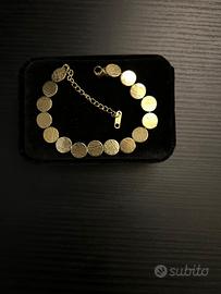 Bracciale oro con monetine in acciaio inox