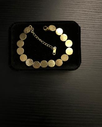 Bracciale oro con monetine in acciaio inox