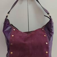 Borsa da donna vera pelle colore viola Alta Moda.