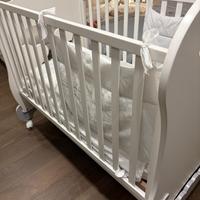 Lettino con sponda regolabile