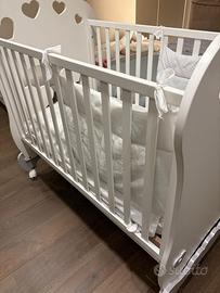 Lettino con sponda regolabile