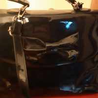 Borsa lucida Camomilla Milano