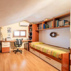 Cameretta angolare con armadio a ponte