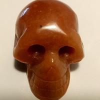 Teschio di pietra dura arancione da collezione