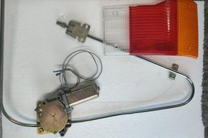 alzacristalli sx plastica fanale postdc A 112