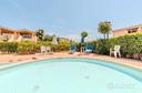 bilocale-con-piscina-terrazza-e-posto-auto
