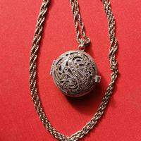 Collana in argento con orologio