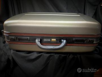 Valigia rigida Spalding con rotelle 