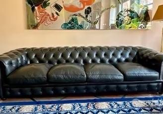 Divano pelle nera Chester di Poltrona Frau