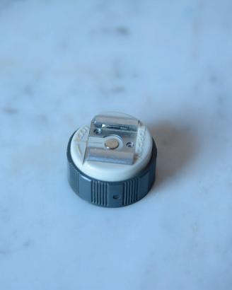 Adattatore hotshoe topcon