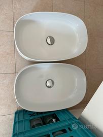 Coppia lavabo da appoggio in ceramica con piletta