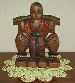Antica scultura in legno pescatore