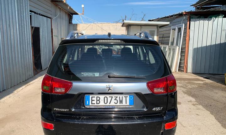 Peugeot 4007 autocarro