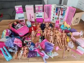 Barbie con vestiti + armadio 