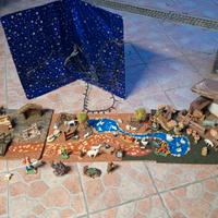 Presepe fatto artigianale con cassette e personagg