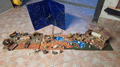 Presepe fatto artigianale con cassette e personagg