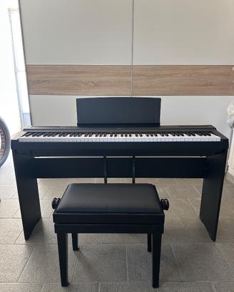 Pianoforte Yamaha con seggiolino