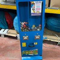 Distributore meccanico palline sorprese e giochi