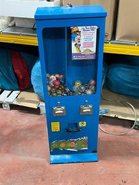 Distributore meccanico palline sorprese e giochi