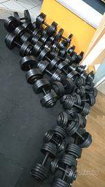 Pesi manubri regolabili palestra ciclette tappeto