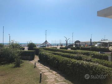 Spazioso Trilocale con Giardino e Vista Mare